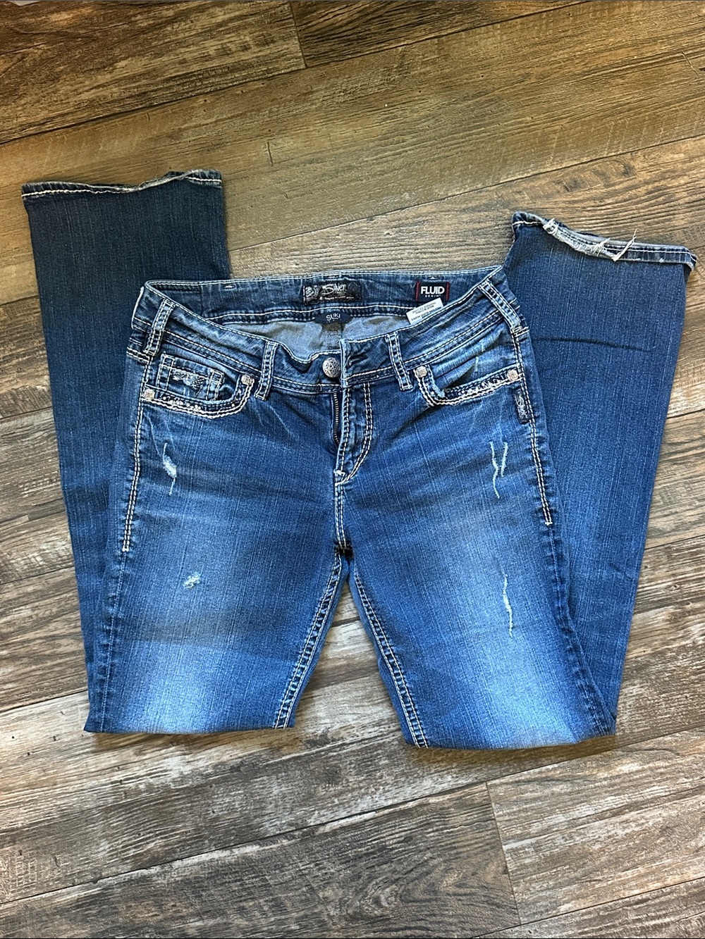 Silver Suki Mid Slim Boot Jeans with Light Distress